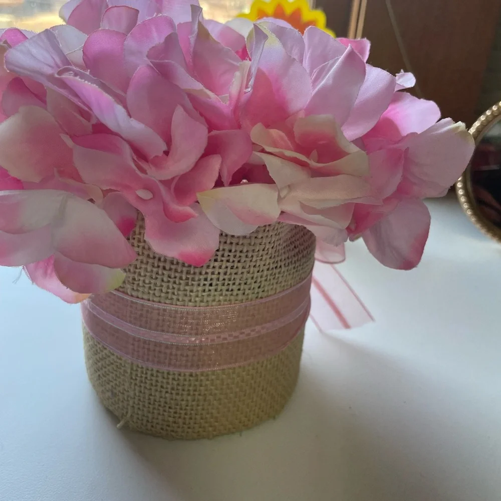 Small Bouquet of Pink Artificial Flowers with a Burlap Pot